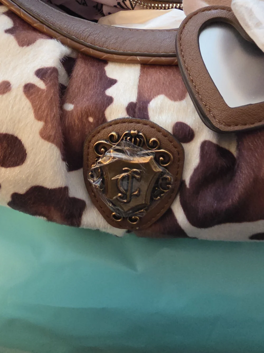 Juicy Couture Saddle Brown & White Cowhide Hobo with Chain Accent